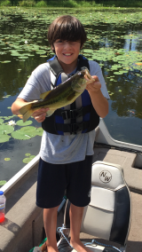 <h5>Round Lake</h5><p>Susan took her family fishing and they loved it! Here's Graham's big catch!</p>