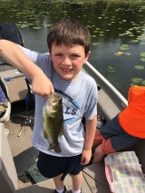 <h5>Round Lake</h5><p>Susan took her family fishing and they loved it! Here's Griffin's big catch!</p>