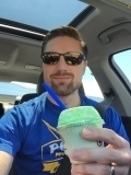 <h5>Nathan enjoying sunshine and ice cream</h5>