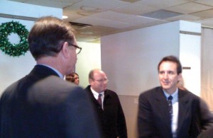 Osseo City Administrator Greg Withers (far left) meets Gov. Pawlenty.